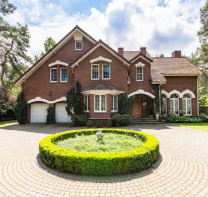 front-view-of-a-driveway-with-a-round-garden-and-b-2023-11-27-04-56-22-utc